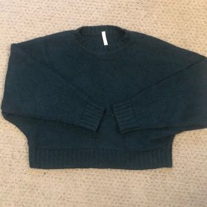 Dark green cropped oversized “Day Off” sweater from Aritzia